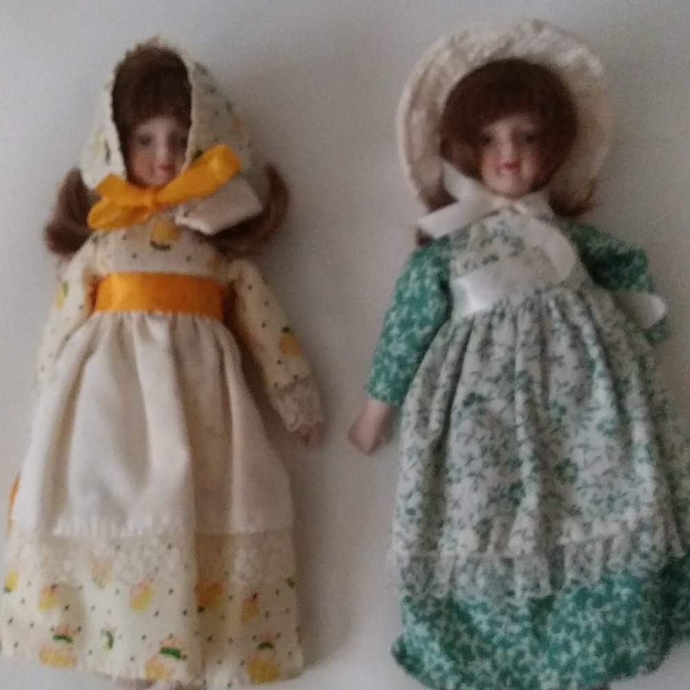 2 Porcelain Dolls